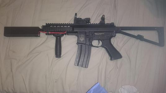 Airsoft Supressor with Battery storage.
