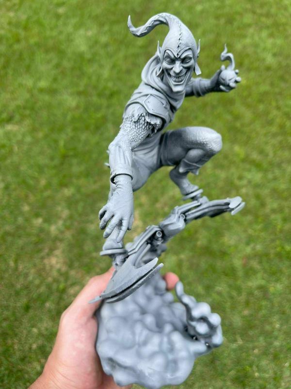 Green goblin statue