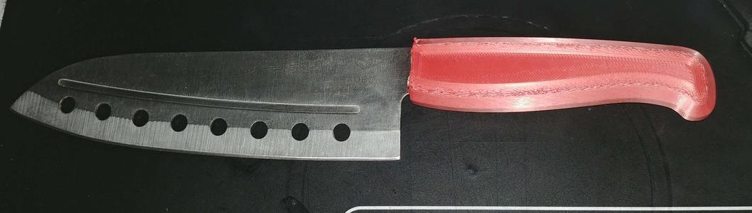 Ergonomic kitchen knife handle / Manche ergonomique pour couteau de cuisine