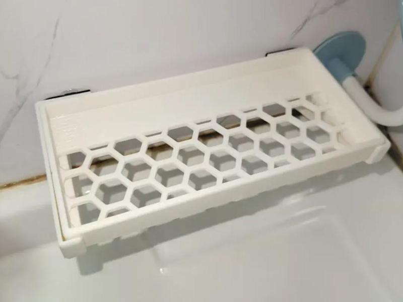 Wall-mounted soap dish