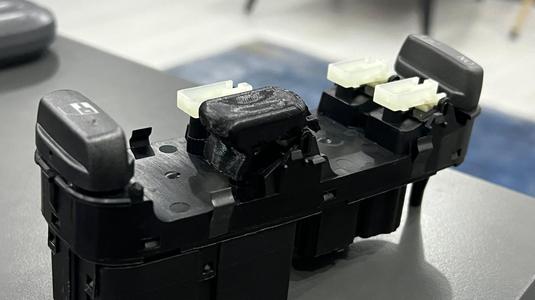 Volvo window opening button