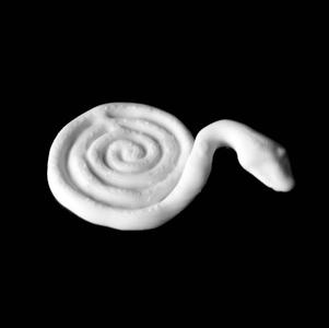 Gold weight in the form of a plain coiled snake with raised head at The British Museum, London