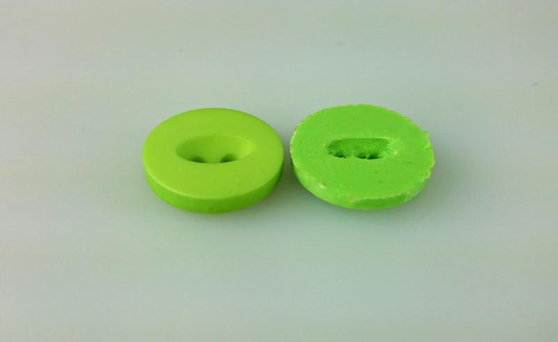 Button for your outfits with elliptical hole at top