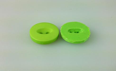 Button for your outfits with elliptical hole at top