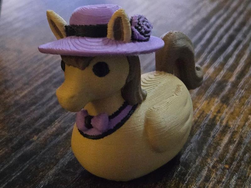Horse duck with a Derby hat.
