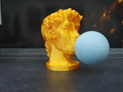 Male bust with chewing gum bubble