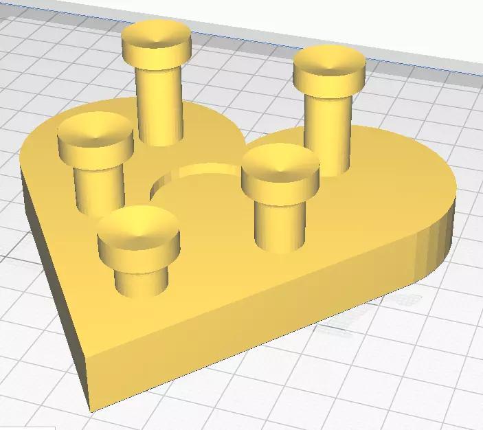 Heart shaped sphere holder