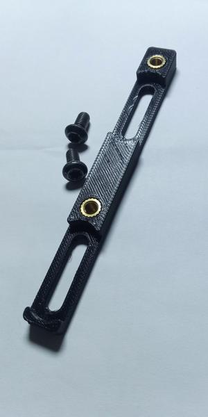 Bicycle bottle cage position adjuster