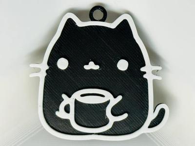 Cute cat drinking coffee