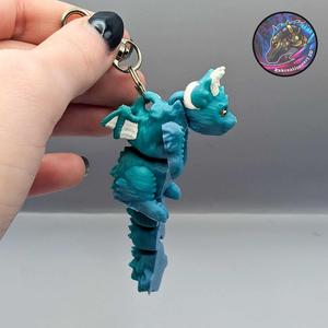 Scruffy Baby Cat Dragon Keychain