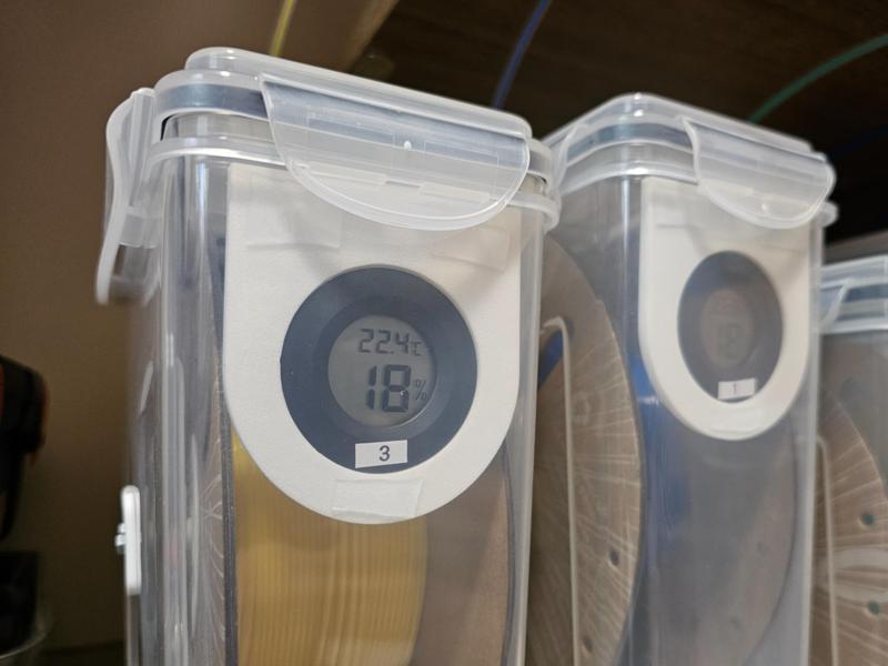 In-box thermometer hygrometer holder