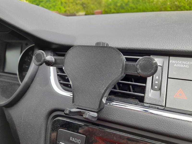 Gravity car phone holder / better clip