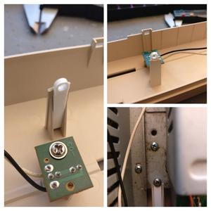 Commodore 128D faceplate screw holder
