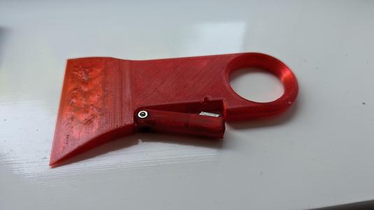 Scraper + filament cutter