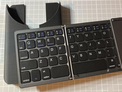 Holder for foldable keyboard