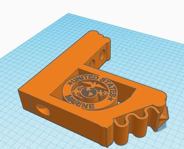 book shelf with U.S.M.C. logo