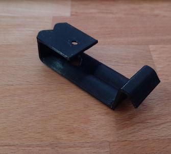 Cable holder for mounting under a table
