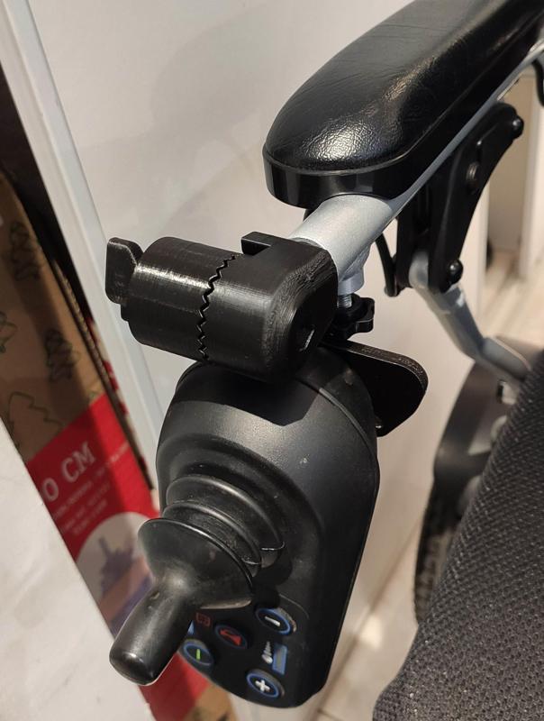Joystick support for wheelchair