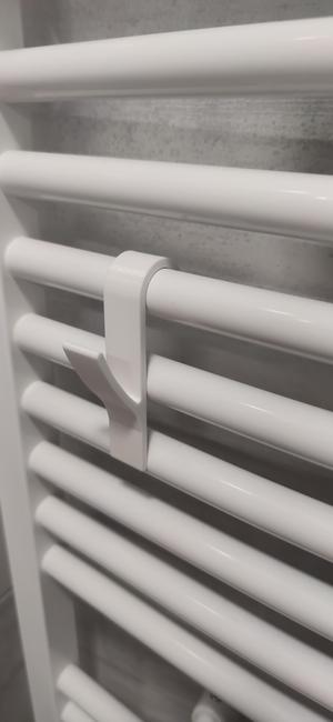 Bathroom radiator towel hanger