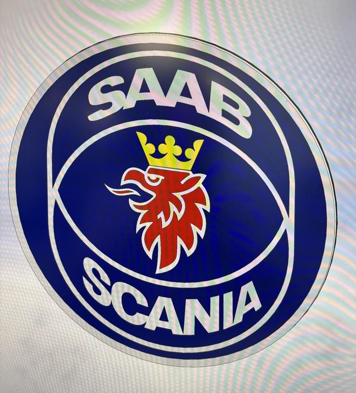 beer coaster with Saab 900 Emblem