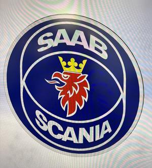 beer coaster with Saab 900 Emblem