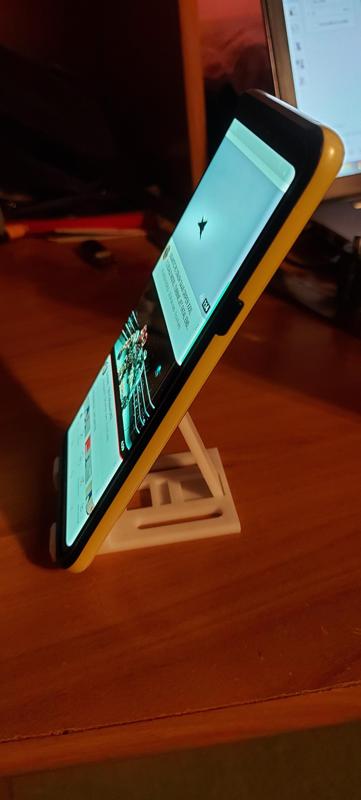 Foldable mobile phone holder