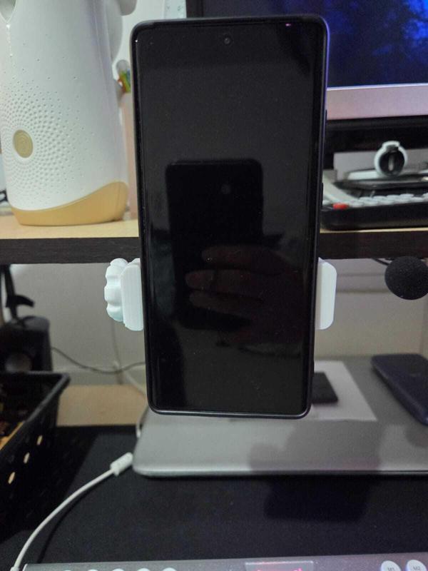 Cell phone holder for desk