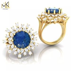 RING with deep blue color stone embraced by diamonds