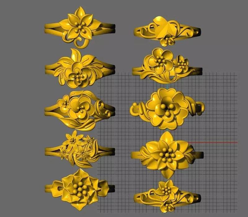 Collection of 10 24k  gold flower rings