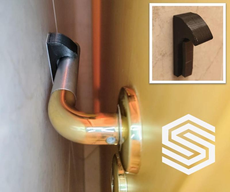 Door stopper / holder 2 in 1