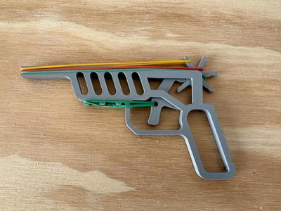 Rubber band Pistol with improved trigger 
