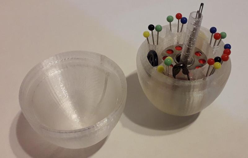 Sewing egg (perfect for socks). Openable container for sewing materials.