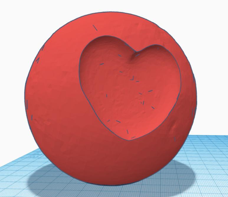 moon with a heart-shaped crater