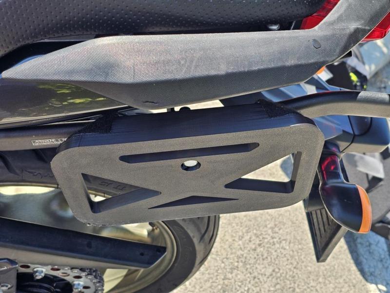 Support for side bags for the motorbike