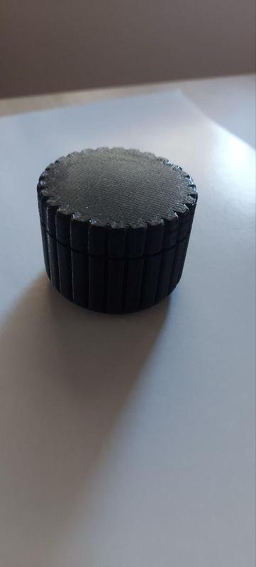 small rounded container