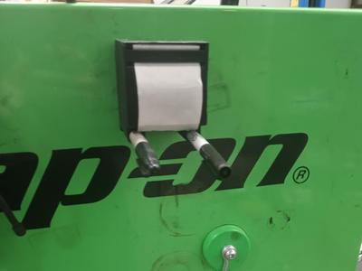 Oil sticker dispenser w/ sharpie holder