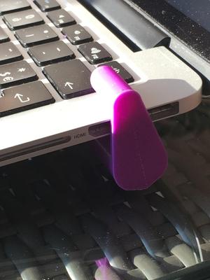 MacBook Pro support with hole for organizing them