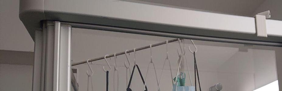 Corner laundry dryer for shower