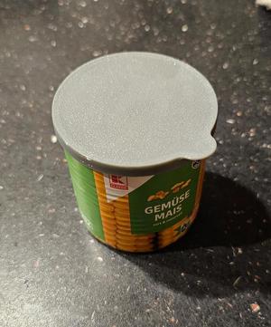Lid for small corn tin