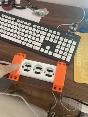 Power strip wall holder