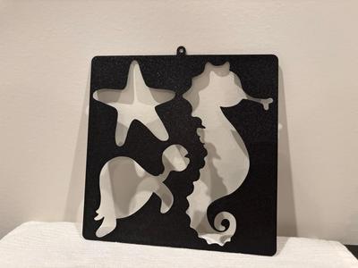 Sealife drawing stencil on a keyring