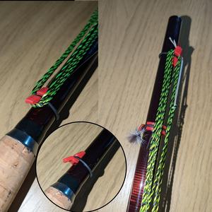 Low profile light weight Tenkara line winder and fly retainer.