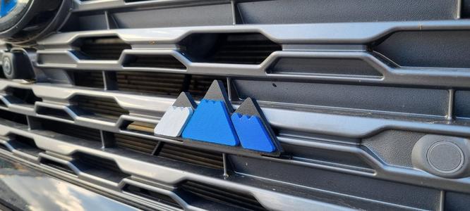 Toyota mountain grille badge