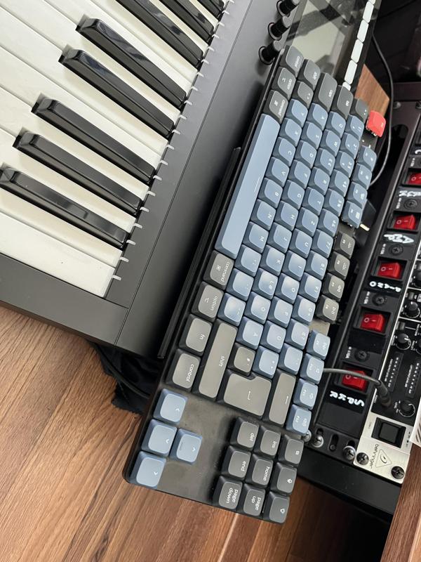 Put your keyboard on a keyboard (or something else)