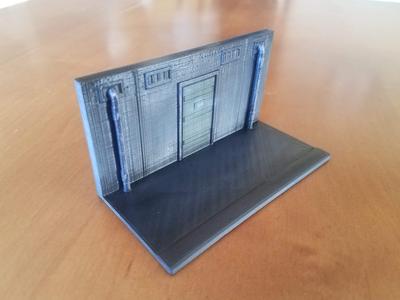 Street scene with pipes and a door