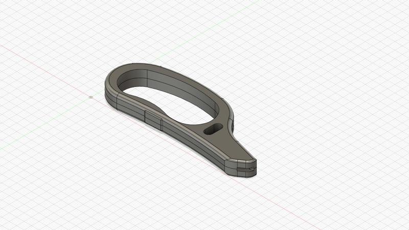 Mango puño para una tijera