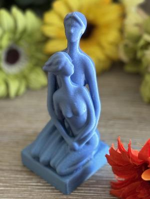 Man and Woman Embracing Figure