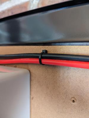 Double cable clip for 6 mm OD cable (9AWG)