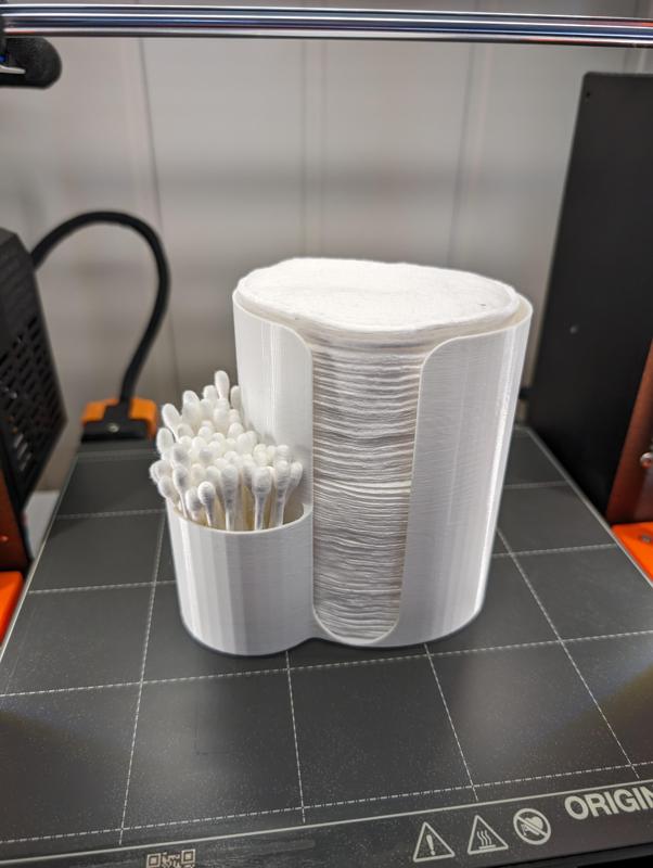 Cotton swabs and elliptical pads container