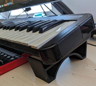 MIDI keyboard desktop stand / raiser feet